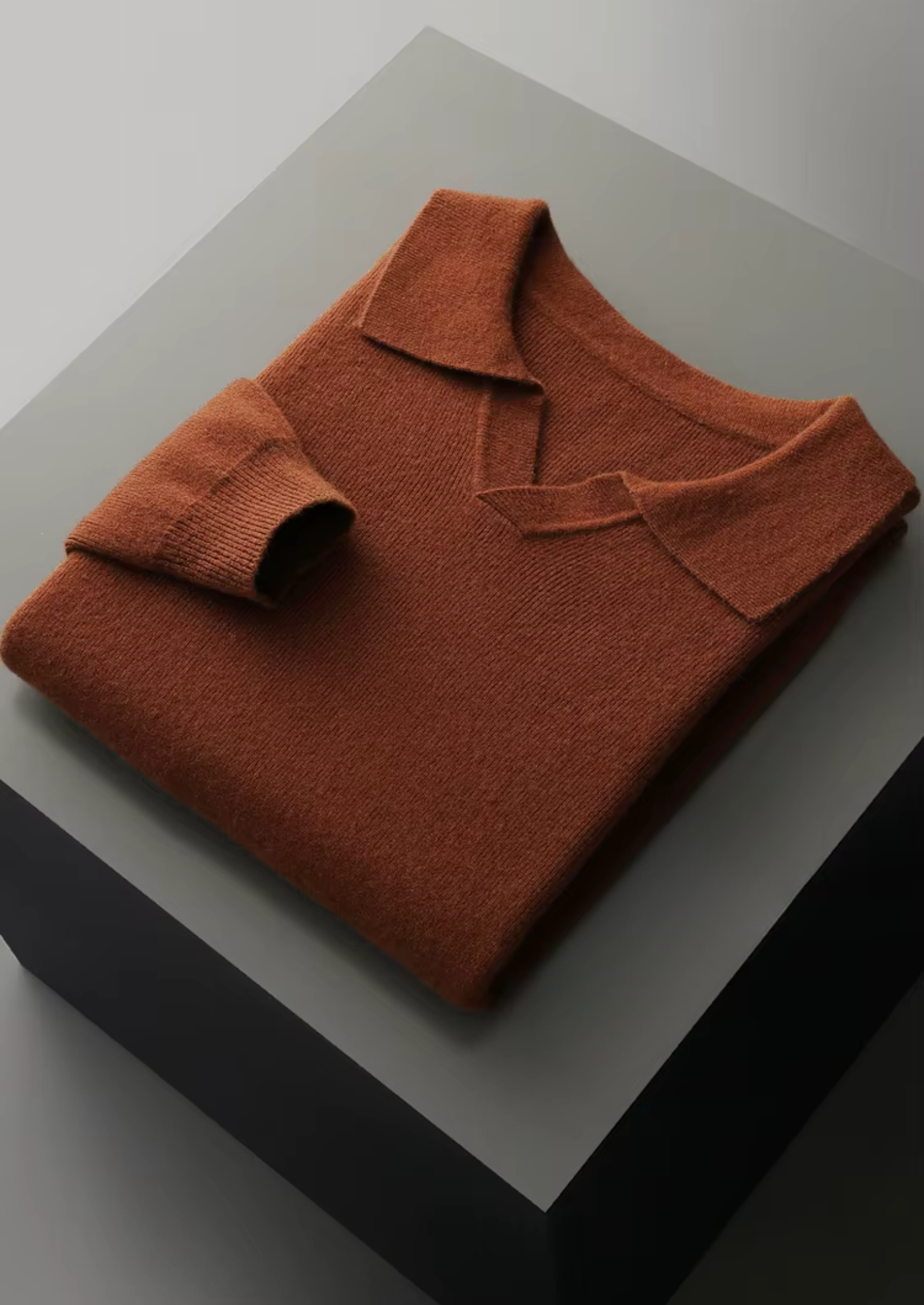 PURE EXTRA-FINE MERINO WOOL RIBBED BUTTONLESS POLO