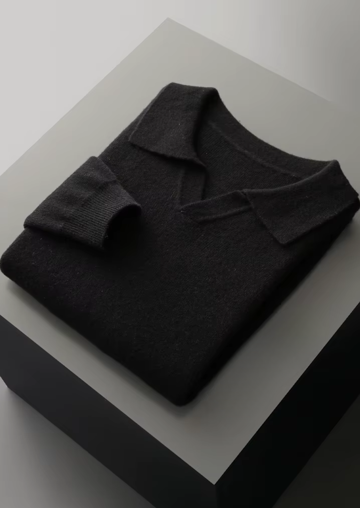 PURE EXTRA-FINE MERINO WOOL RIBBED BUTTONLESS POLO